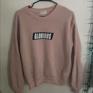 pink “glorious” sweater